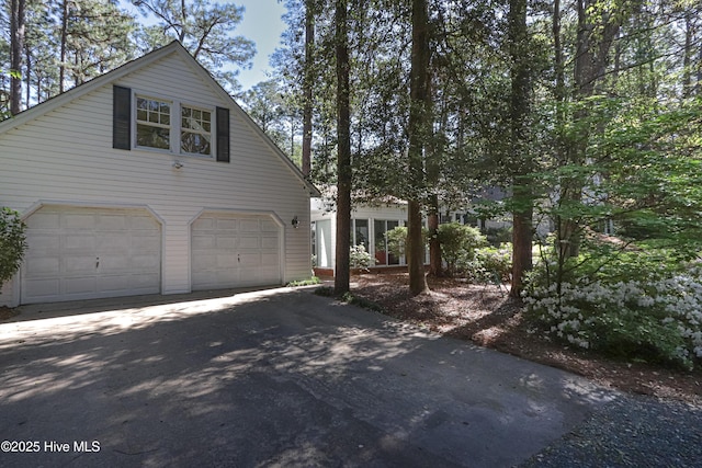 1335 Midland Rd, Southern Pines, NC 28387 - view of front of property featuring driveway and a garage