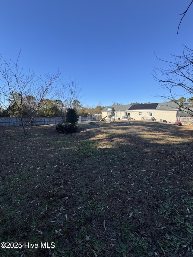 view of yard featuring fence