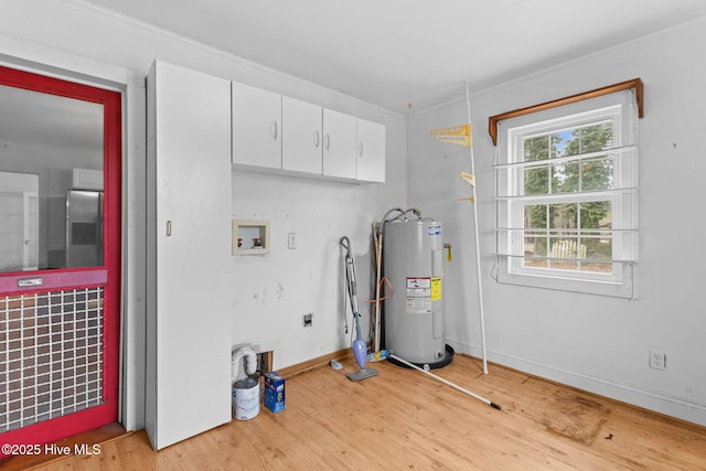 utility room with electric water heater