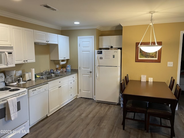 kitchen featuring white appliances, dark wood-style floors, visible vents, a sink, and white cabinetry