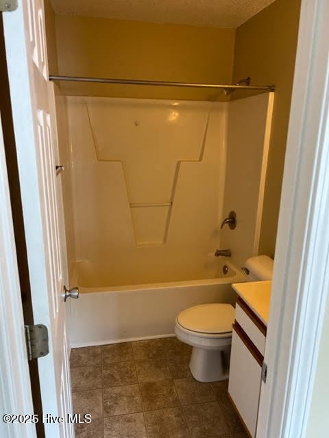 full bathroom with shower / bath combination, toilet, and vanity