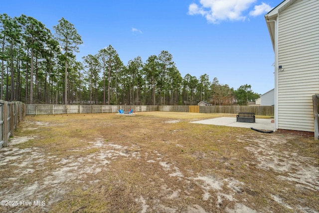 view of yard with a patio and a fenced backyard