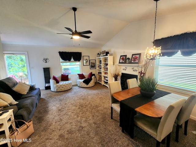 3206 Deer Path Cir, New Bern, NC 28560 - carpeted dining room featuring ceiling fan, a fireplace, a chandelier, and lofted ceiling