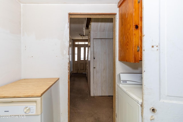 laundry area with cabinet space and washer and clothes dryer