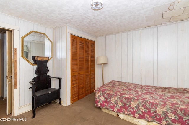 carpeted bedroom with a closet