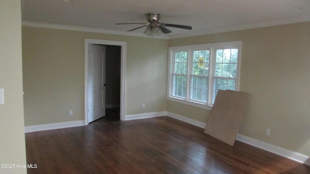 empty room with crown molding, dark wood-style floors, baseboards, and ceiling fan