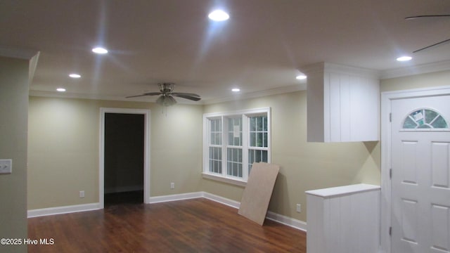 foyer with wood finished floors, baseboards, recessed lighting, ceiling fan, and crown molding