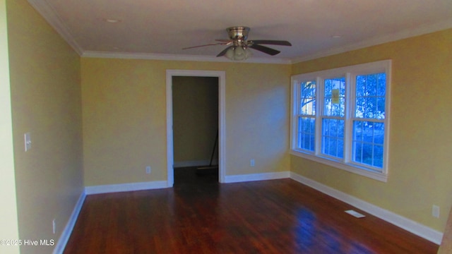 unfurnished room with wood finished floors, a ceiling fan, baseboards, and ornamental molding