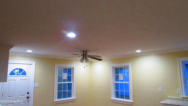 entryway featuring recessed lighting, a ceiling fan, and ornamental molding