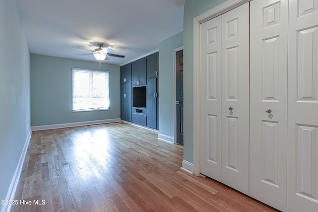 240 Donald Ross Dr, Pinehurst, NC 28374 - unfurnished living room with ceiling fan, light wood-type flooring, and baseboards