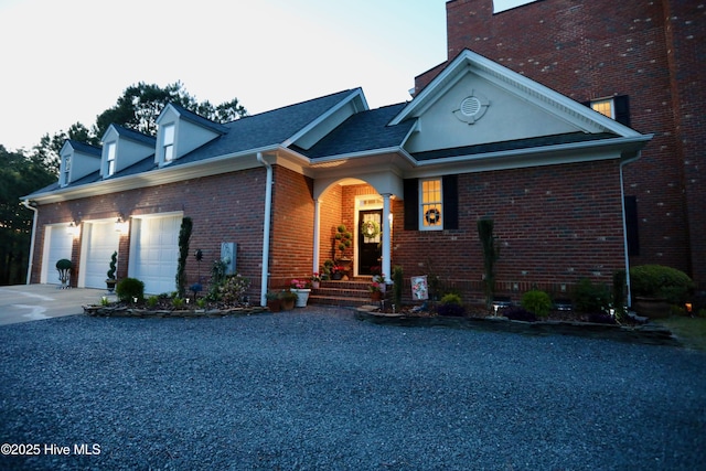 6680 Beulah Hill Church Rd, West End, NC 27376 - view of front of house featuring driveway, an attached garage, and brick siding