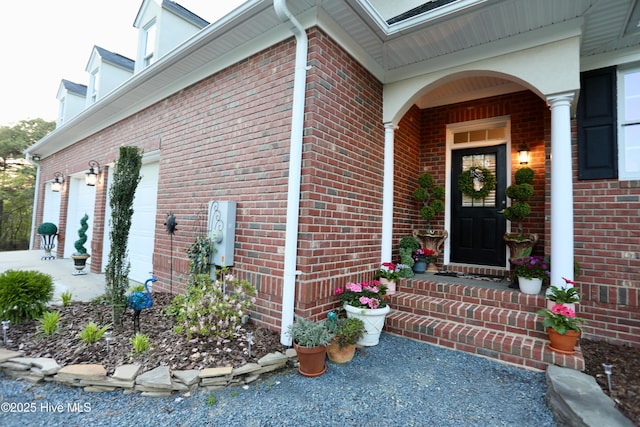 6680 Beulah Hill Church Rd, West End, NC 27376 - view of exterior entry with brick siding and a garage