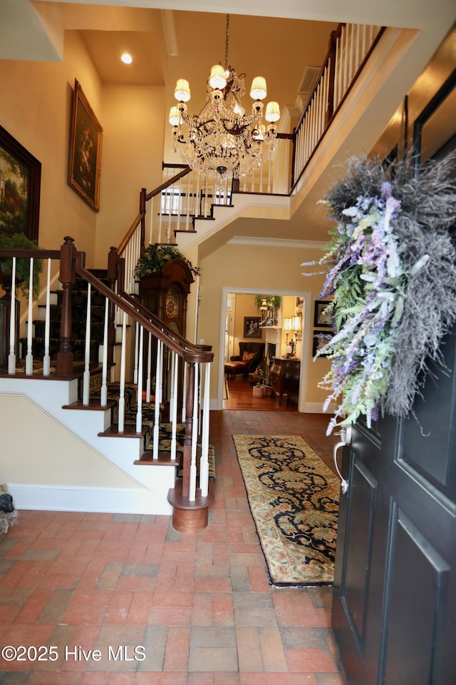 6680 Beulah Hill Church Rd, West End, NC 27376 - foyer with a chandelier, stairway, a towering ceiling, recessed lighting, and crown molding