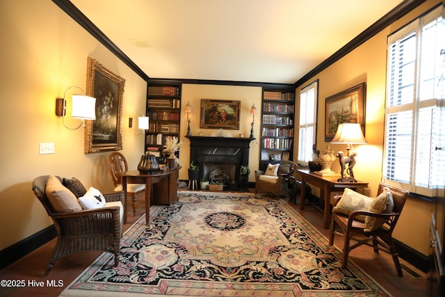 6680 Beulah Hill Church Rd, West End, NC 27376 - living room with ornamental molding, a fireplace, and built in features