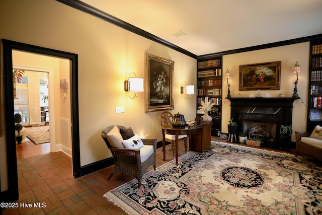 6680 Beulah Hill Church Rd, West End, NC 27376 - living area featuring brick flooring, a fireplace, and crown molding