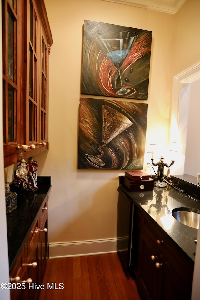 6680 Beulah Hill Church Rd, West End, NC 27376 - bar with baseboards and dark wood-style flooring