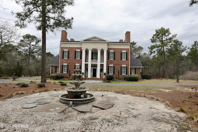 6680 Beulah Hill Church Rd, West End, NC 27376 - greek revival inspired property with a chimney and brick siding