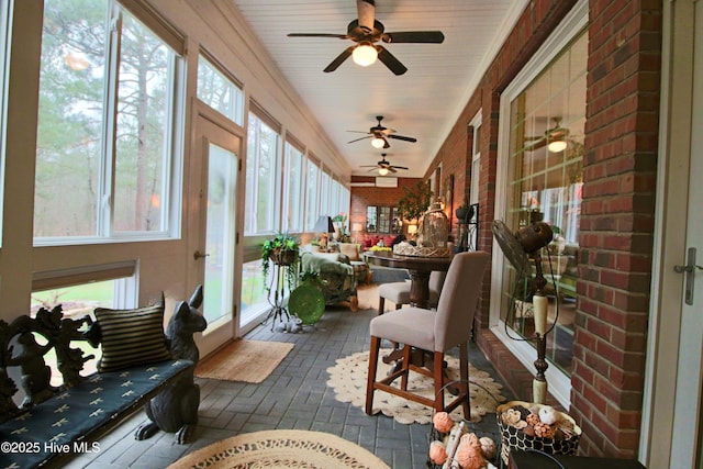 6680 Beulah Hill Church Rd, West End, NC 27376 - sunroom / solarium with brick flooring, ceiling fan, and brick wall