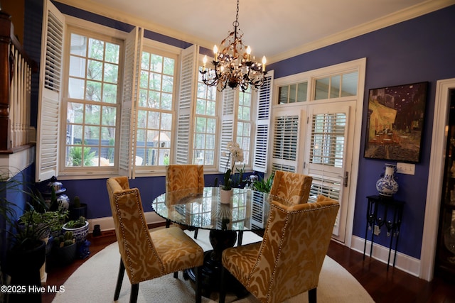 6680 Beulah Hill Church Rd, West End, NC 27376 - dining area featuring a chandelier, wood finished floors, and crown molding
