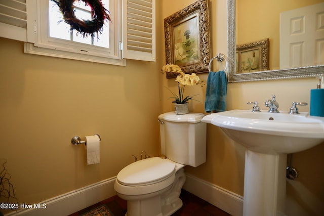 6680 Beulah Hill Church Rd, West End, NC 27376 - bathroom with toilet and baseboards