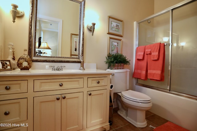 6680 Beulah Hill Church Rd, West End, NC 27376 - bathroom featuring tile patterned flooring, vanity, and bath / shower combo with glass door