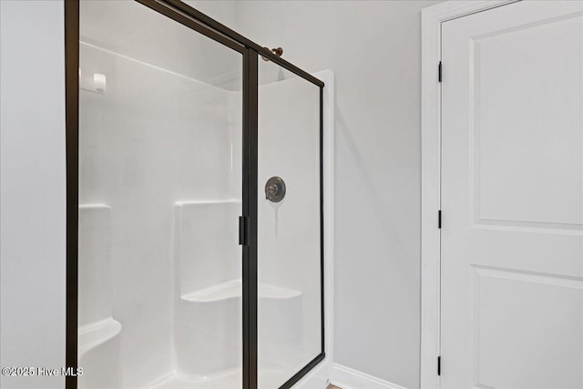 bathroom featuring a stall shower
