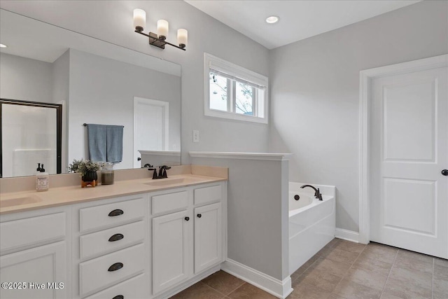 full bath featuring baseboards, double vanity, a bath, an enclosed shower, and a sink