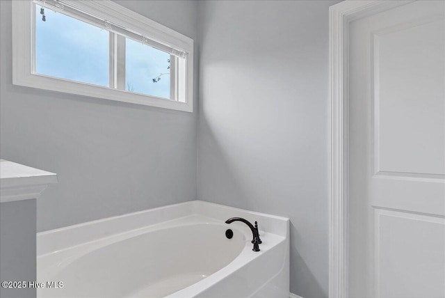 full bath featuring a bath