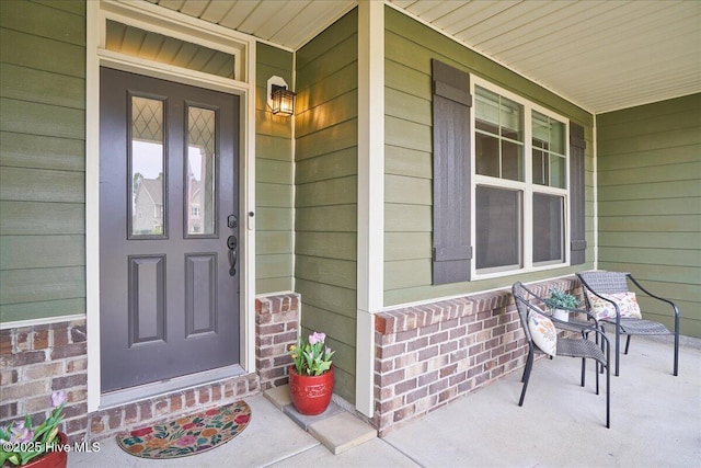 entrance to property with a porch