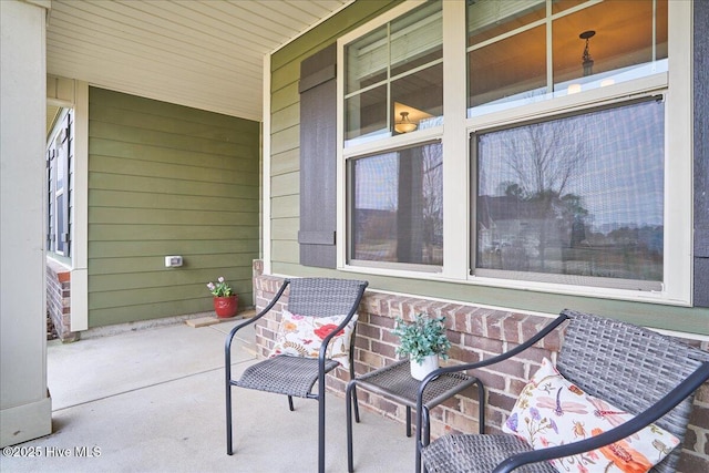 view of patio featuring a porch