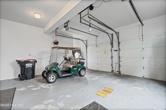 garage featuring a garage door opener