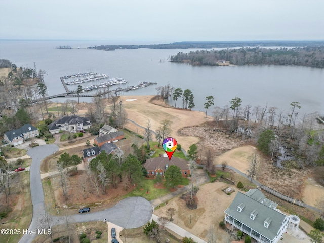 drone / aerial view with a water view