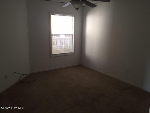 527 Spring Forest Rd Unit F, Greenville, NC 27834 - carpeted spare room featuring a ceiling fan