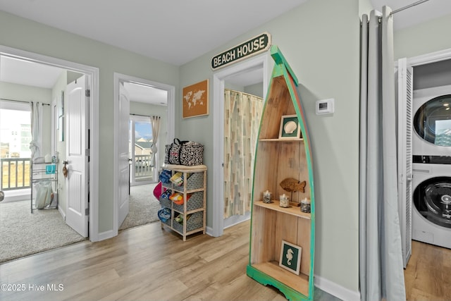 318 N Topsail Dr, Surf City, NC 28445 - hall with stairway, baseboards, and wood finished floors