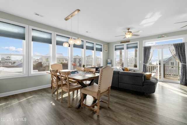 318 N Topsail Dr, Surf City, NC 28445 - living area featuring baseboards, wood finished floors, visible vents, and ceiling fan
