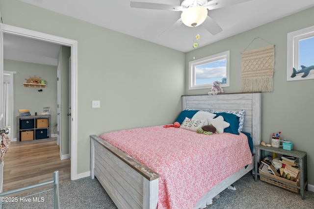 318 N Topsail Dr, Surf City, NC 28445 - clothes washing area featuring carpet, wood finished floors, laundry area, and stacked washing maching and dryer