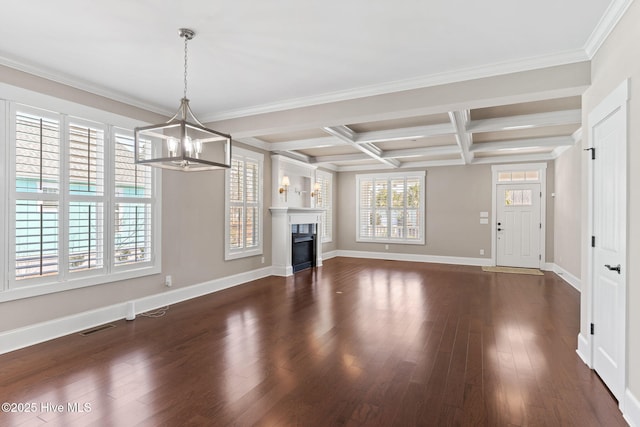 unfurnished living room with a chandelier, visible vents, coffered ceiling, and dark wood-type flooring