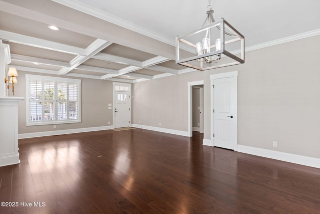 interior space featuring an inviting chandelier, wood finished floors, baseboards, and coffered ceiling