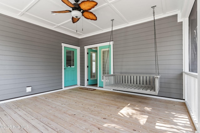 wooden terrace with ceiling fan