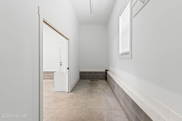 hallway featuring concrete floors