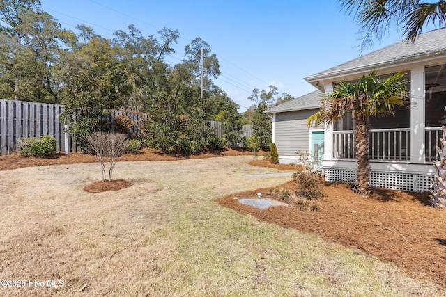 view of yard featuring fence