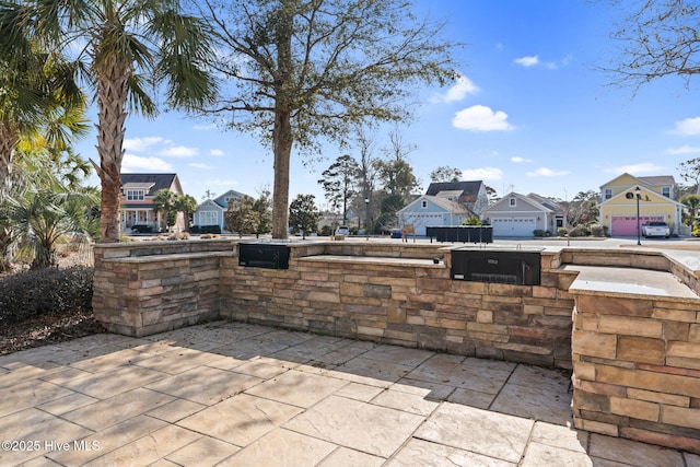 view of patio featuring a residential view