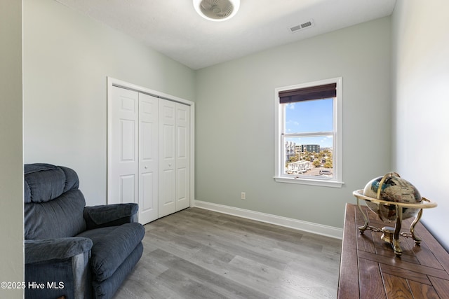 208 Carolina Beach Ave S # 300, Carolina Beach, NC 28428 - living area featuring wood finished floors and baseboards