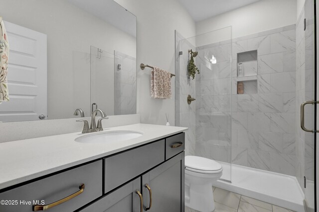 410 Sugar Cv, Wilmington, NC 28411 - bathroom featuring vanity and a stall shower