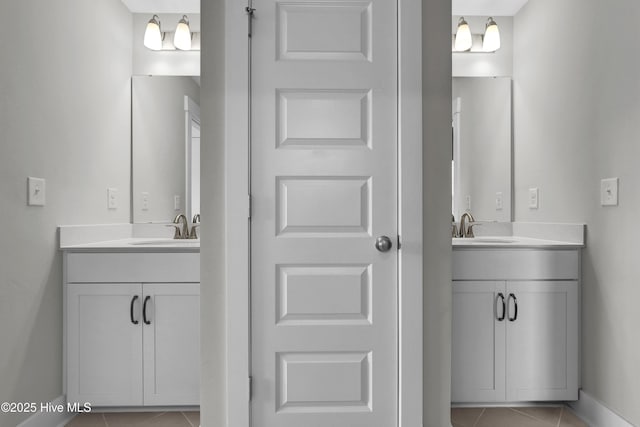 410 Sugar Cv, Wilmington, NC 28411 - bathroom with tile patterned flooring and two vanities