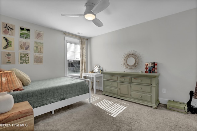 410 Sugar Cv, Wilmington, NC 28411 - bedroom with light colored carpet and ceiling fan