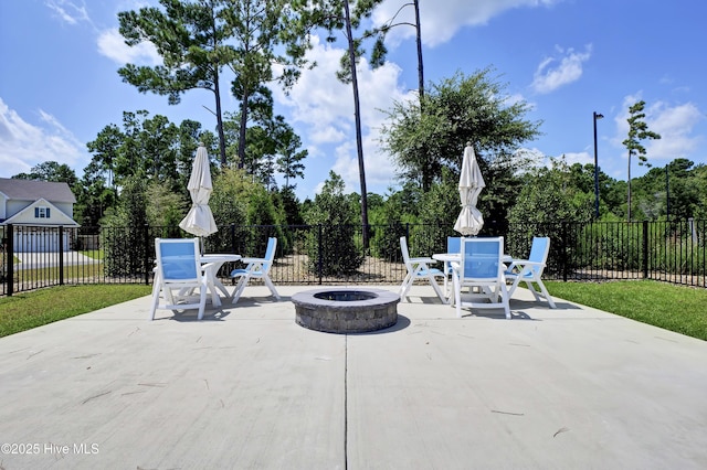 410 Sugar Cv, Wilmington, NC 28411 - view of patio / terrace featuring a fire pit and outdoor dining space