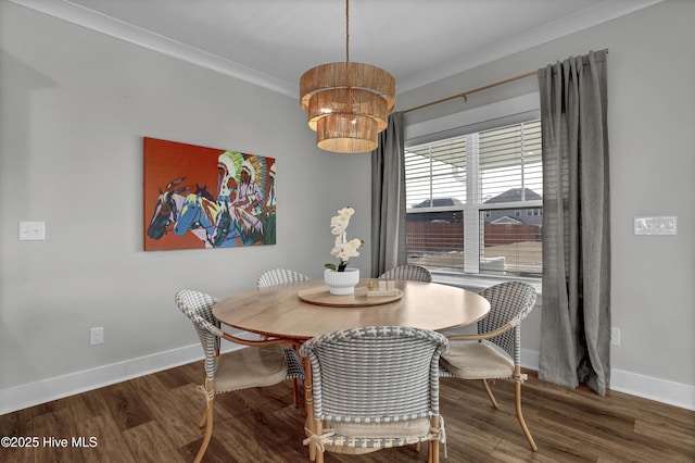 410 Sugar Cv, Wilmington, NC 28411 - dining room with wood finished floors, crown molding, and a chandelier