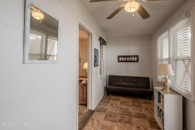 107 Carolina Beach Ave S, Carolina Beach, NC 28428 - hallway featuring stone finish floor, plenty of natural light, and wooden walls