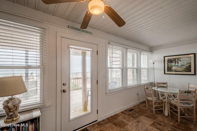 107 Carolina Beach Ave S, Carolina Beach, NC 28428 - doorway featuring a wealth of natural light, crown molding, and baseboards